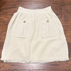CHANEL CC Elegant Cream Skirt with Lace Trim